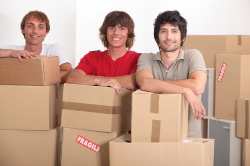 Professional movers handling furniture